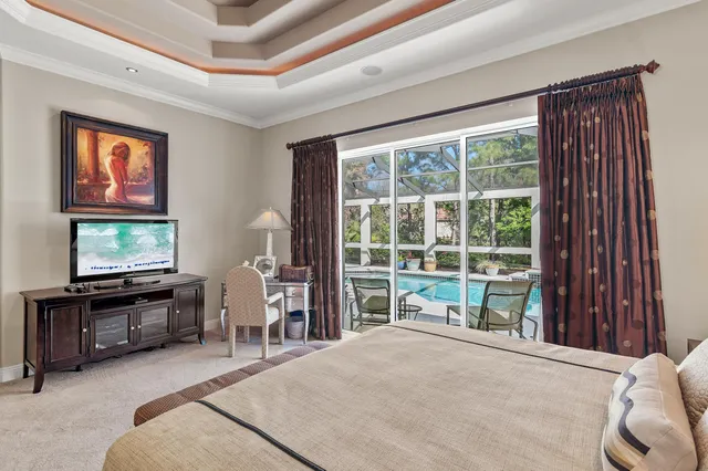 an aerial view of a house with outdoor space