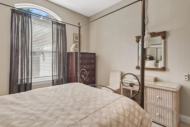 a view of a deck with wooden floor and outdoor seating