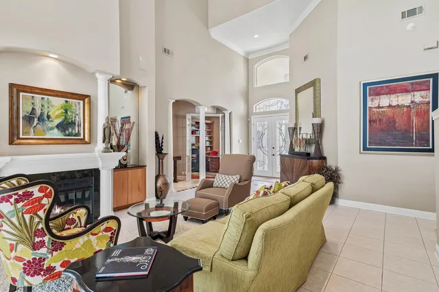 a view of a dining room with furniture and window