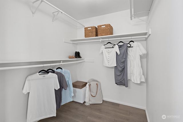 a bathroom with a tub and shower