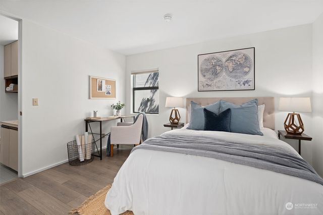 a view of a hallway with washer and dryer