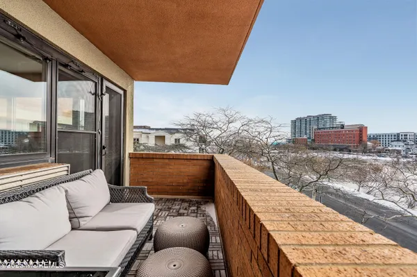 a living room with a couch and a flat screen tv