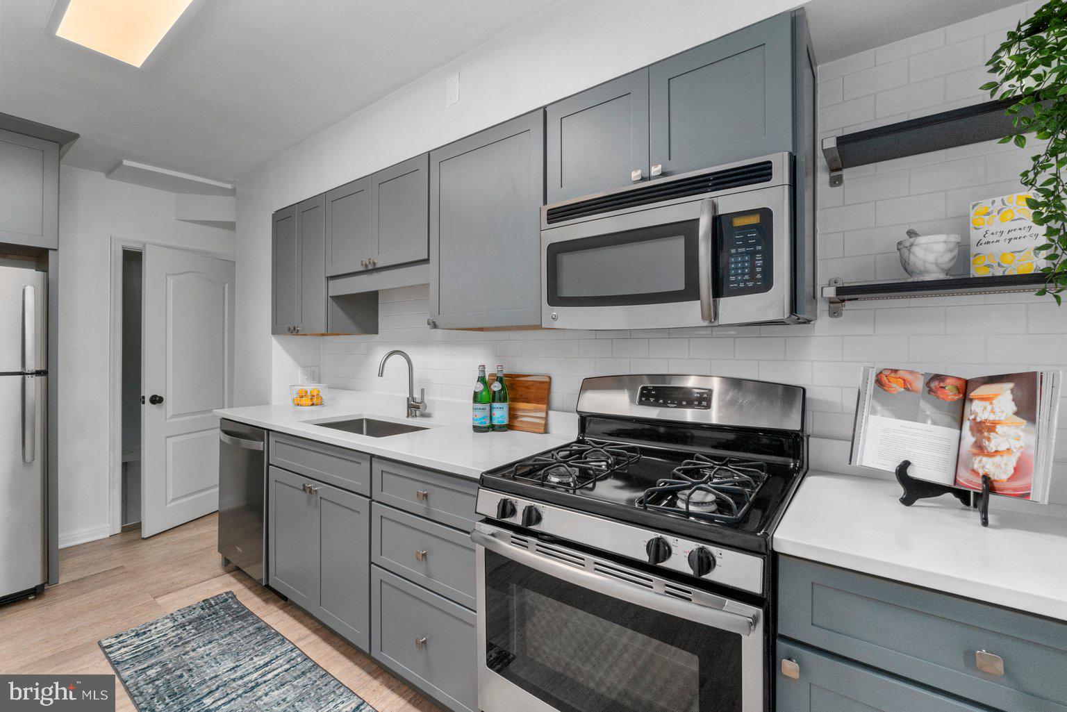 615 Braeside Road Baltimore, MD 21229 - Photo 14 of 31 Gas range, Open shelving + soft close cabs