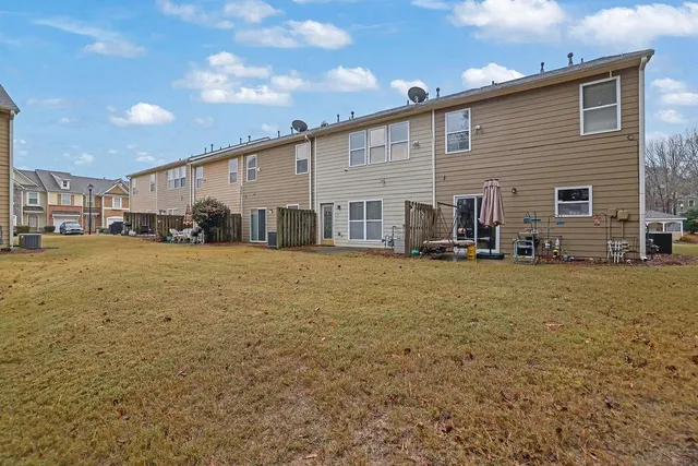 a view of a house with a big yard