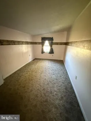 a view of a room with shelves