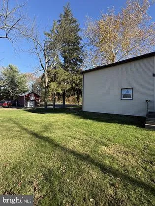 a view of a yard with an outdoor space