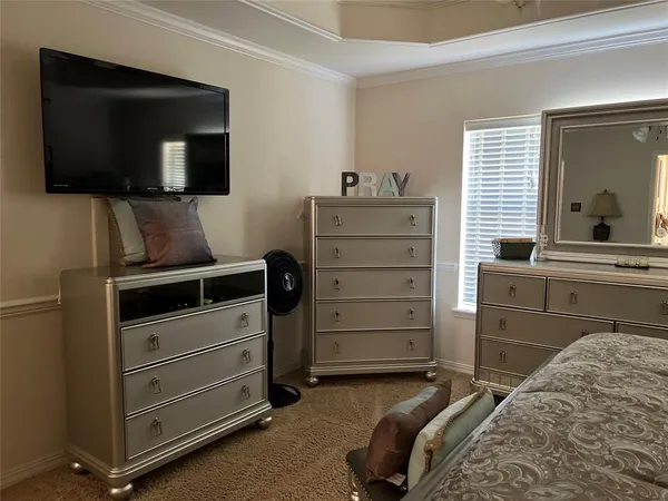 a bathroom with a bathtub sink and mirror
