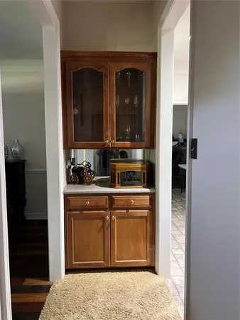 a kitchen with a sink and cabinets