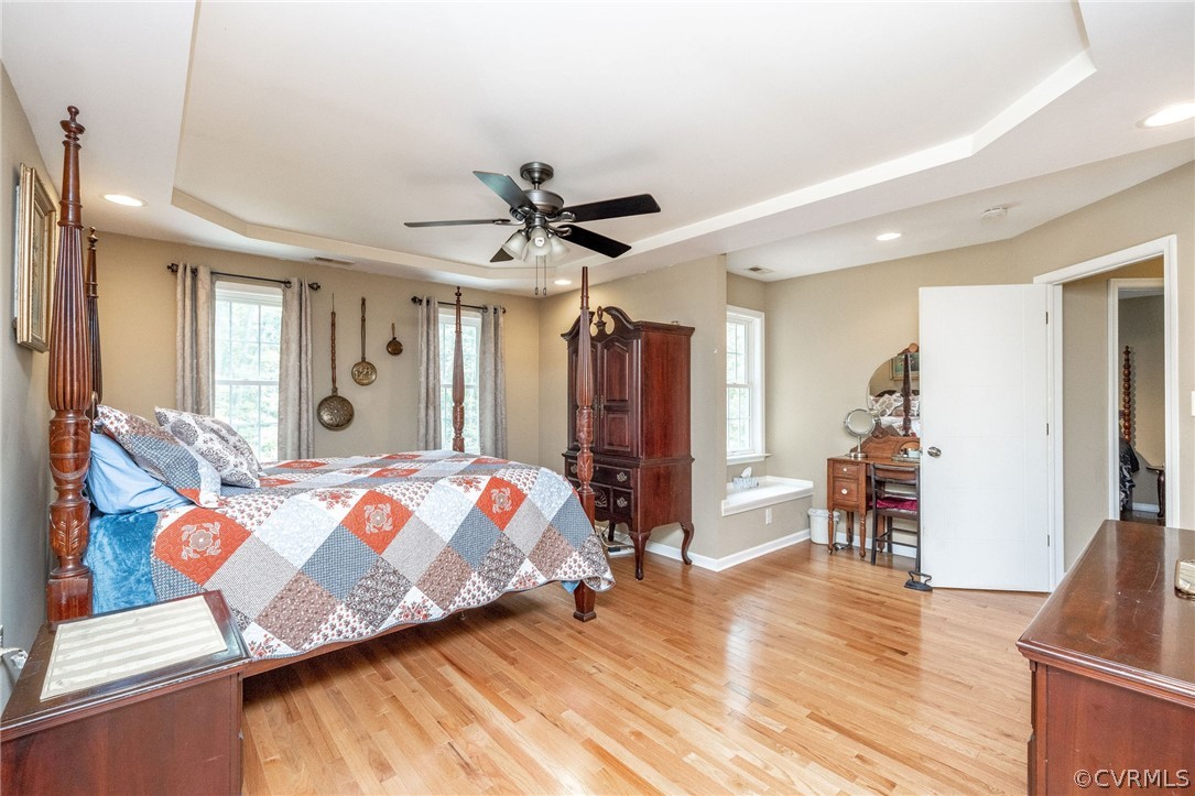 4952 Shannon Road Kents Store, VA 23084 - Photo 14 of 40 a bedroom with furniture and wooden floor