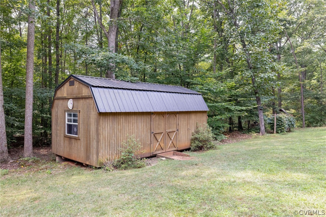 4952 Shannon Road Kents Store, VA 23084 - Photo 30 of 40 a view of a backyard