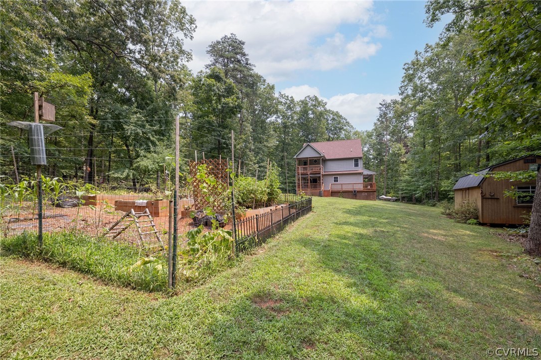 4952 Shannon Road Kents Store, VA 23084 - Photo 33 of 40 a view of a house with a yard and sitting area