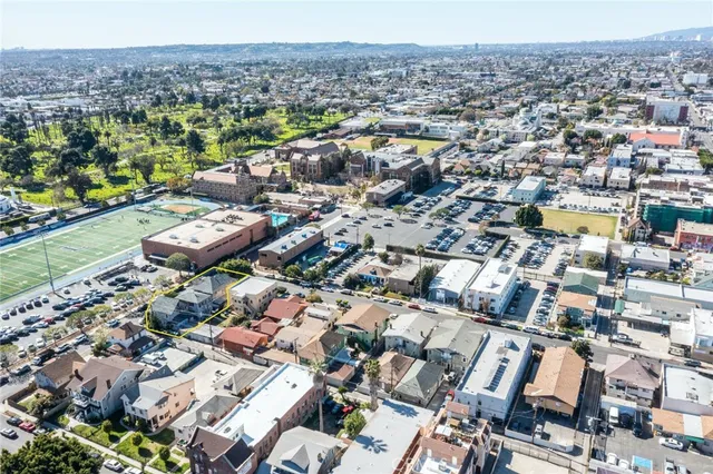 an aerial view of a city with lots of residential buildings