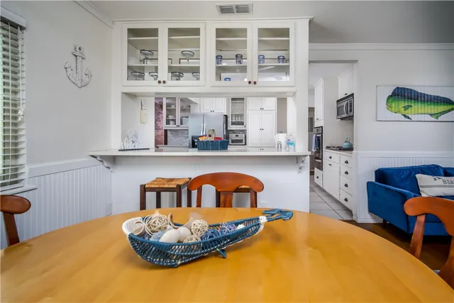a kitchen with a sink a stove and a workspace