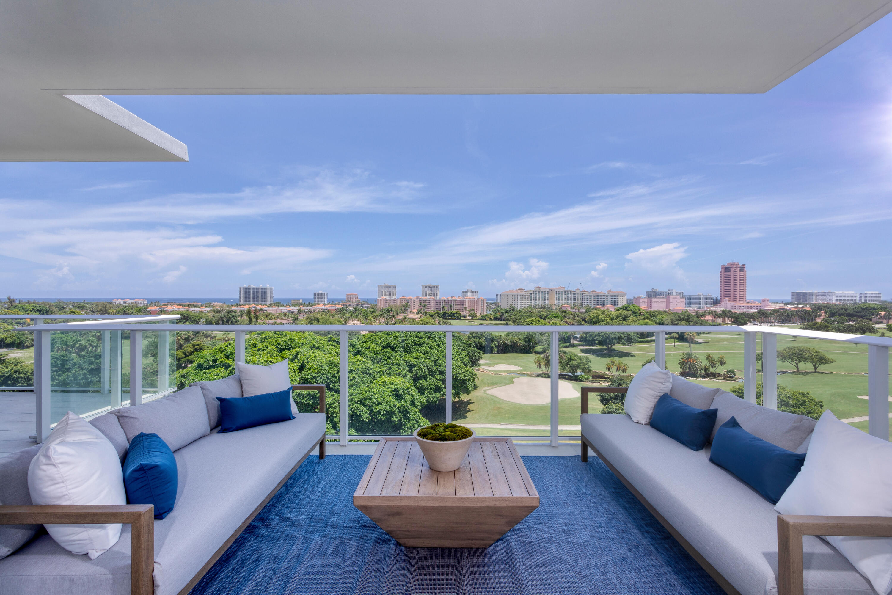 200 Southeast Mizner Boulevard, Unit PH18 Boca Raton, FL 33432 - Photo 1 of 49 a view of a patio with couches and city view