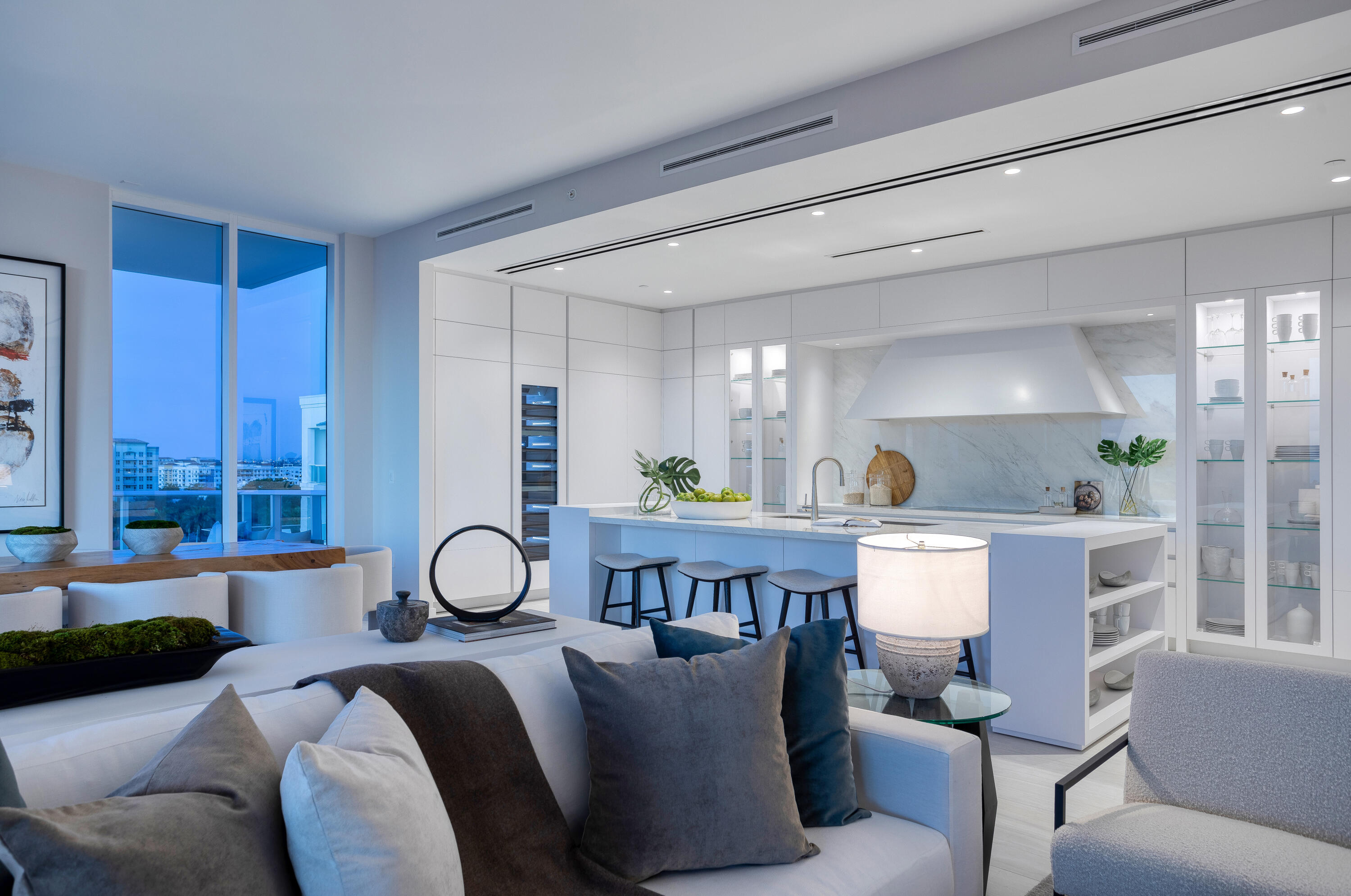 200 Southeast Mizner Boulevard, Unit PH18 Boca Raton, FL 33432 - Photo 14 of 49 a living room with furniture a rug and a window