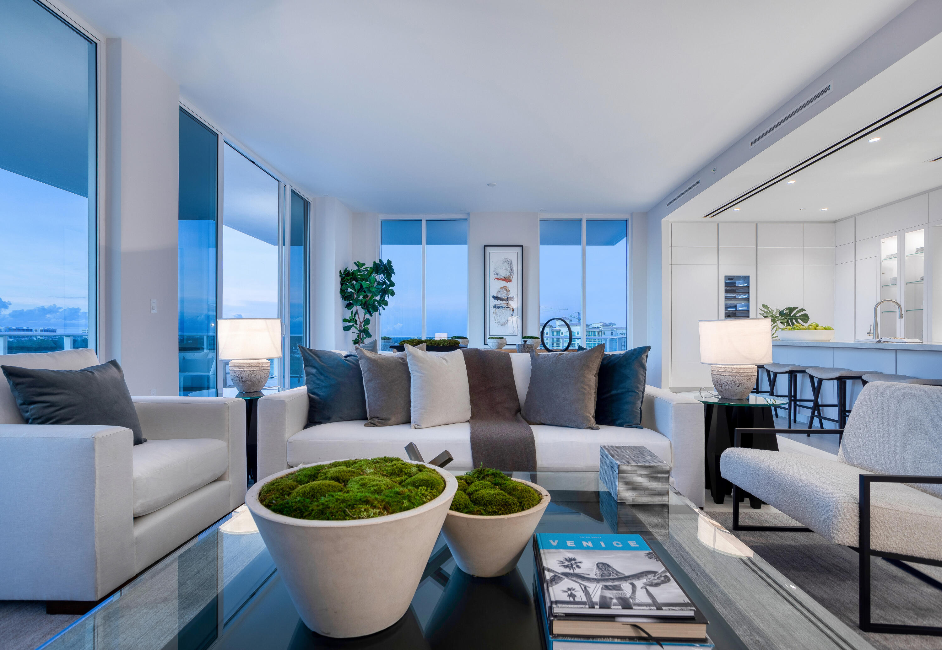 200 Southeast Mizner Boulevard, Unit PH18 Boca Raton, FL 33432 - Photo 15 of 49 a living room with furniture and a potted plant