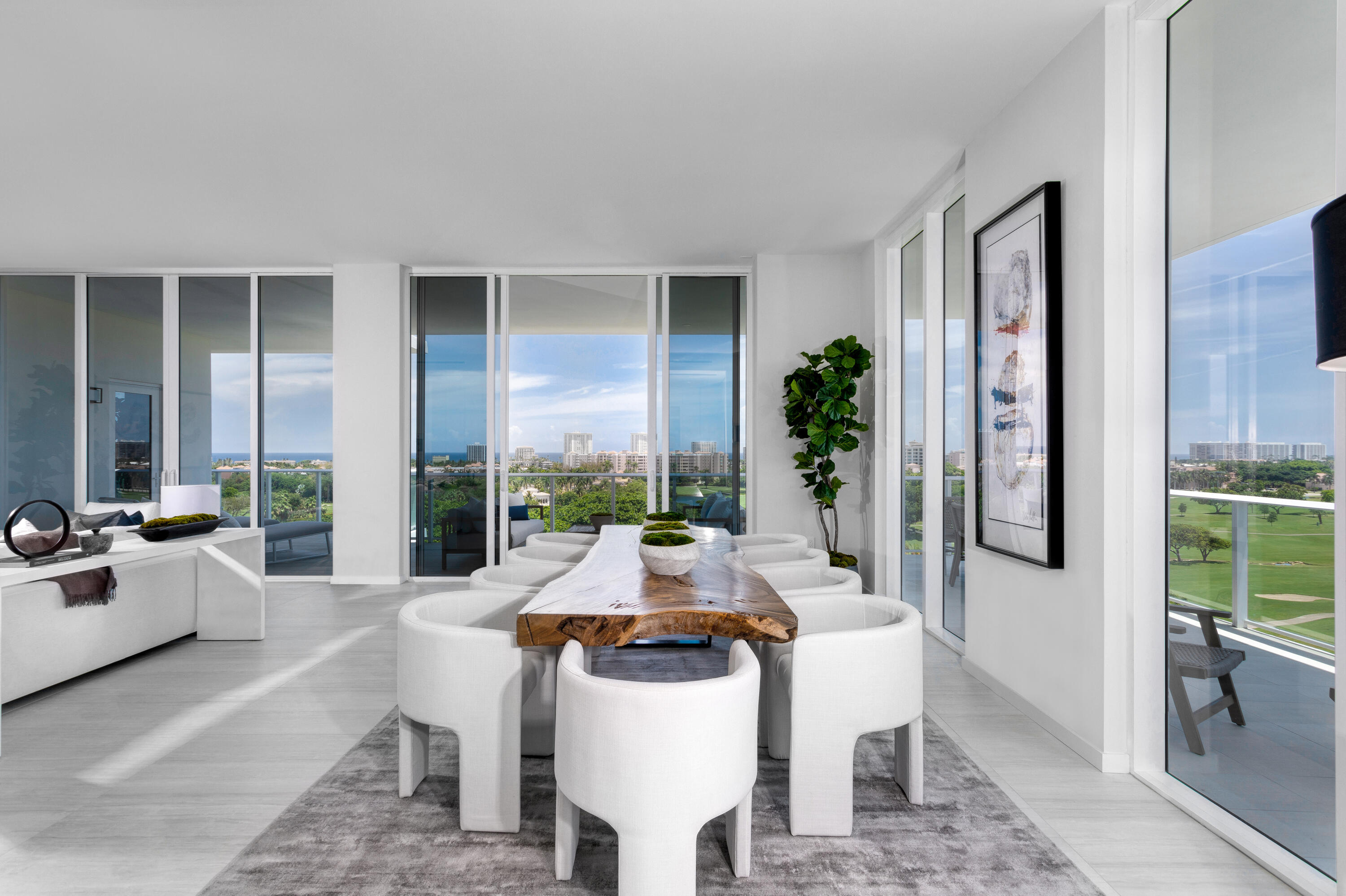 200 Southeast Mizner Boulevard, Unit PH18 Boca Raton, FL 33432 - Photo 21 of 49 a view of a dining room with furniture window and outside view