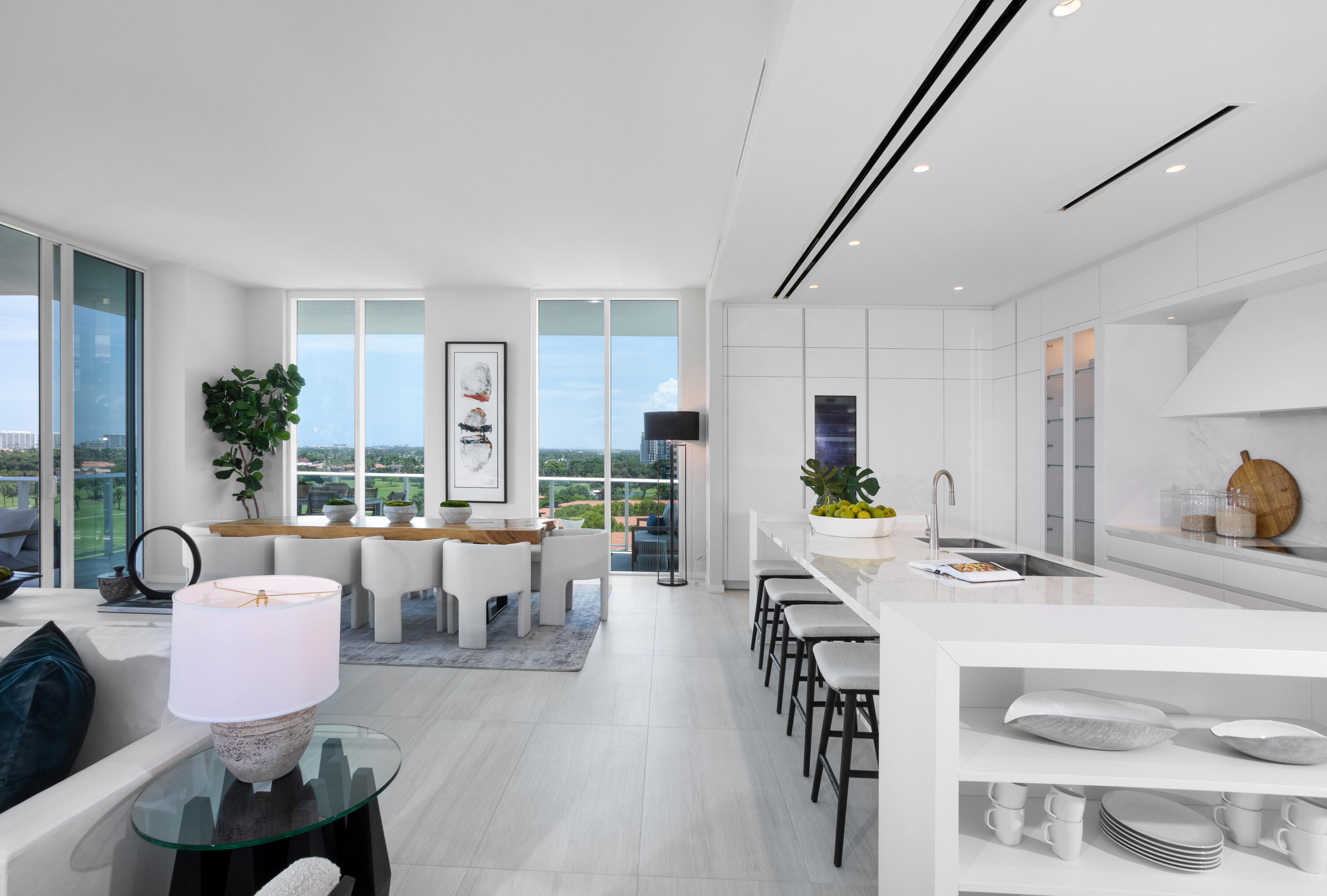 200 Southeast Mizner Boulevard, Unit PH18 Boca Raton, FL 33432 - Photo 25 of 49 a living room with furniture kitchen view and a large window