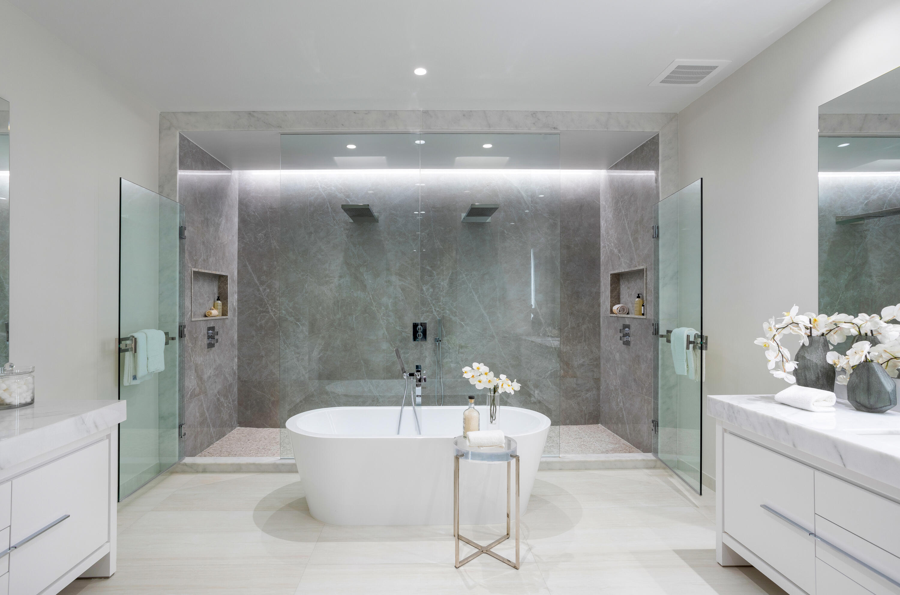 200 Southeast Mizner Boulevard, Unit PH18 Boca Raton, FL 33432 - Photo 36 of 49 a spacious bathroom with a bathtub and shower