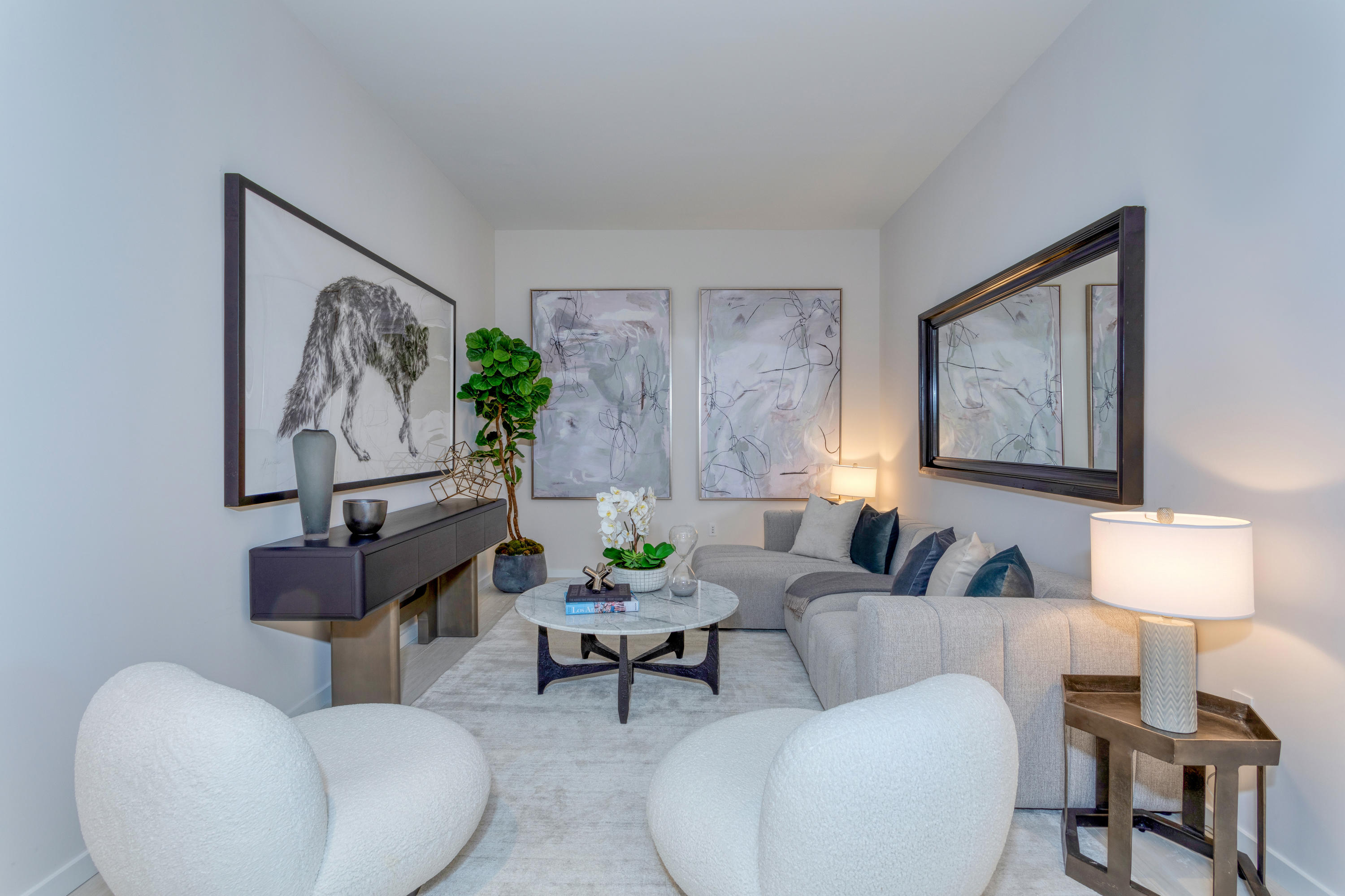 200 Southeast Mizner Boulevard, Unit PH18 Boca Raton, FL 33432 - Photo 39 of 49 a living room with furniture and a painting on the wall