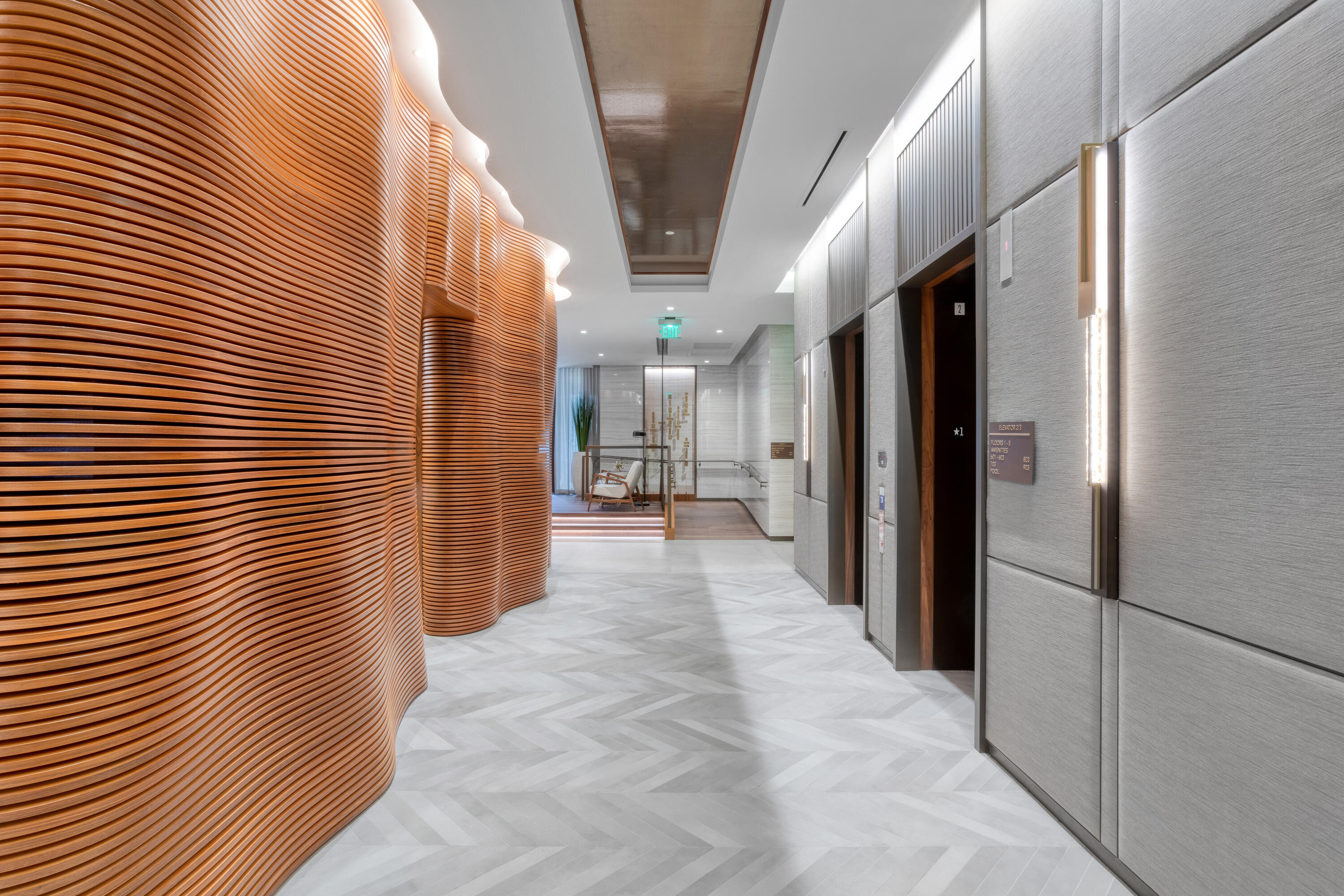 200 Southeast Mizner Boulevard, Unit PH18 Boca Raton, FL 33432 - Photo 46 of 49 a view of a hallway with wooden cabinets
