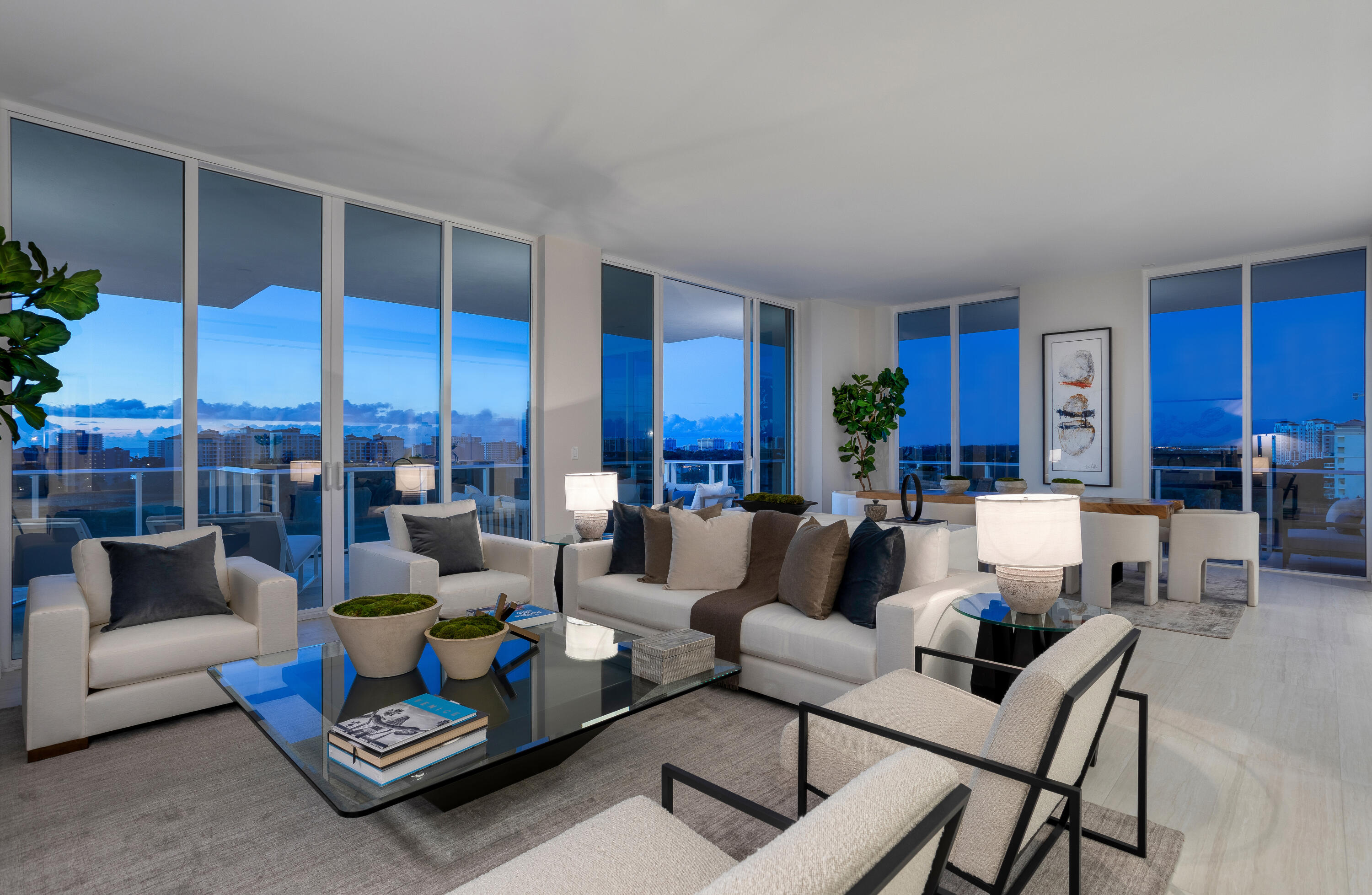200 Southeast Mizner Boulevard, Unit PH18 Boca Raton, FL 33432 - Photo 5 of 49 a living room with furniture a rug and a view of kitchen
