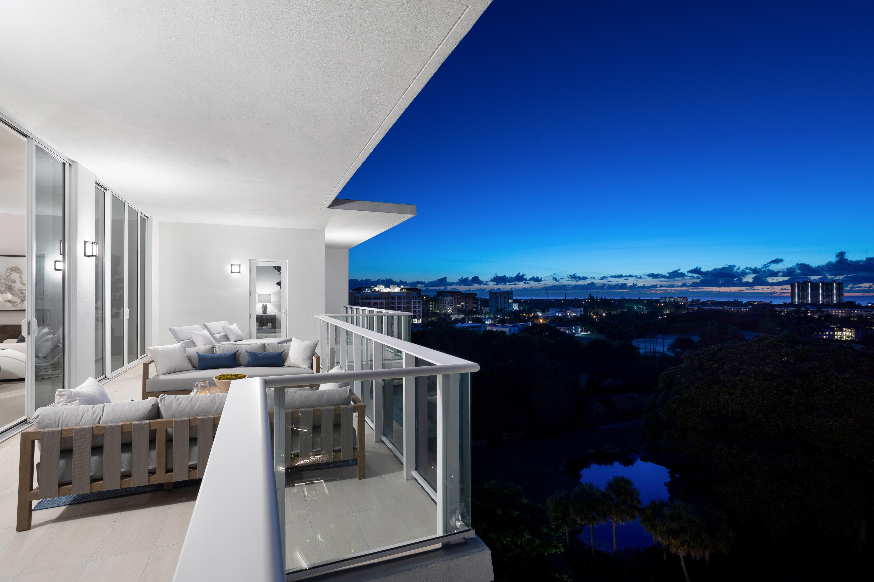 200 Southeast Mizner Boulevard, Unit PH18 Boca Raton, FL 33432 - Photo 7 of 49 a living room with furniture and a floor to ceiling window