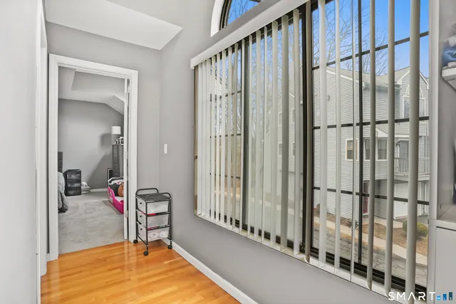 a view of a bedroom with bathroom