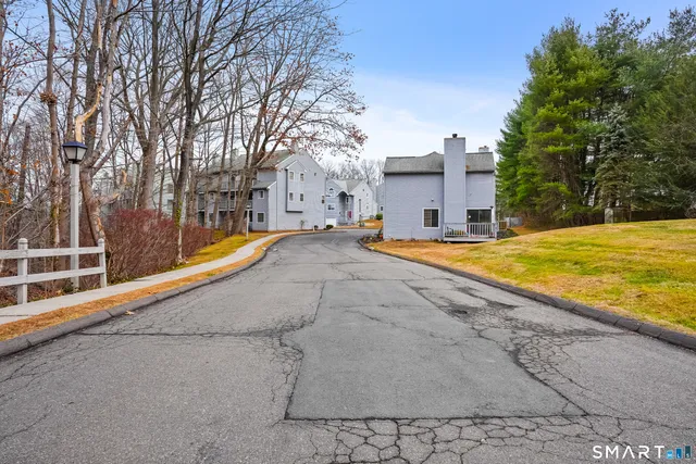 a view of a sign board with yard