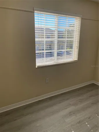 a view of a room that has a window in it