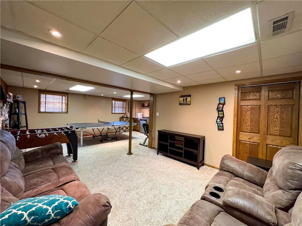 212 Meridian Road Butler, PA 16001 - Photo 15 of 25 a living room with furniture and a flat screen tv
