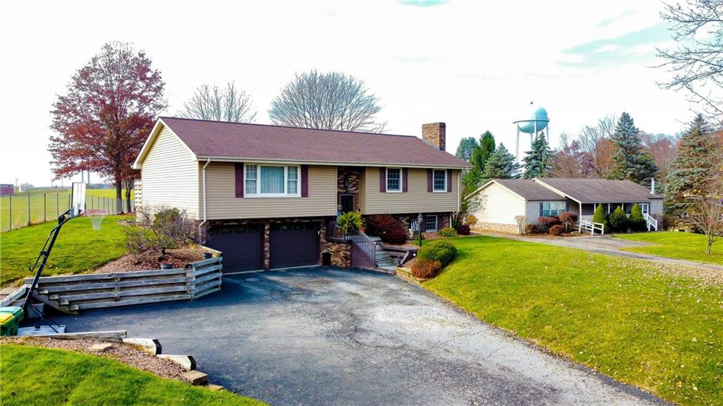 212 Meridian Road Butler, PA 16001 - Photo 25 of 25 a view of a house with a yard and sitting area