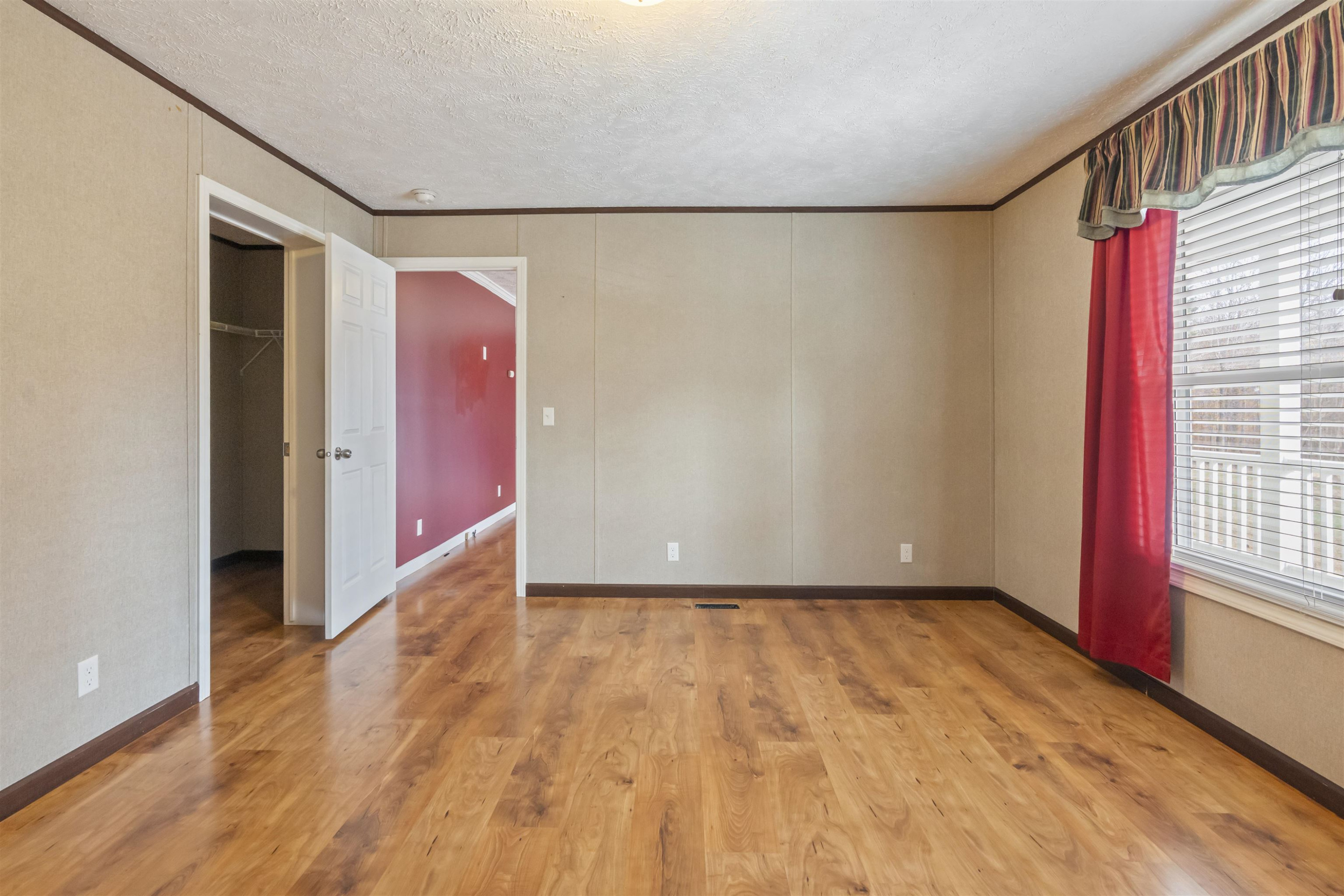1069 West Perry Road Siler City, NC 27344 - Photo 18 of 55 Master Bedroom Looking into Living Room