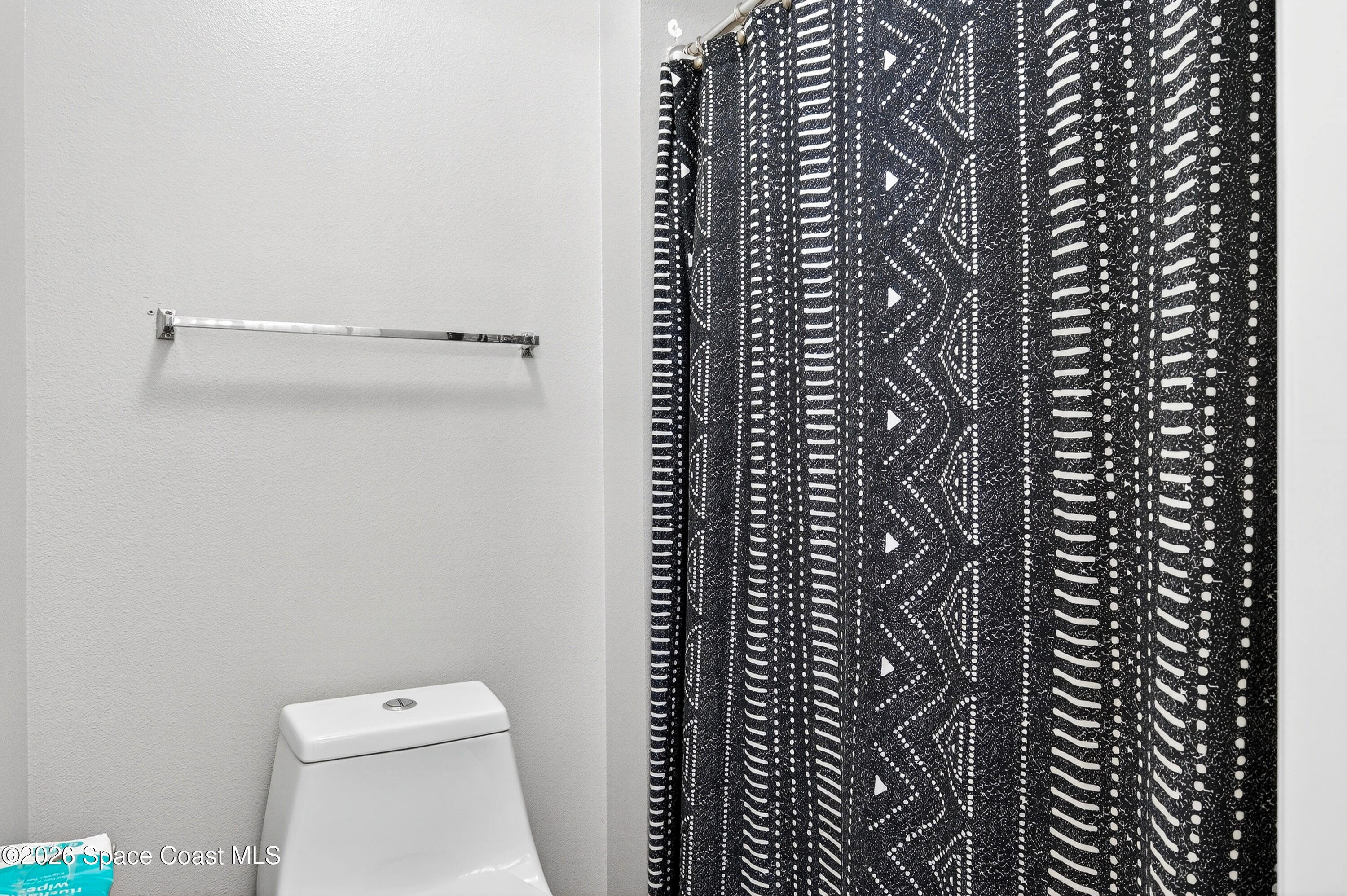 3393 Echo Ridge Place Cocoa, FL 32926 - Photo 28 of 40 a bathroom with a toilet and a shower