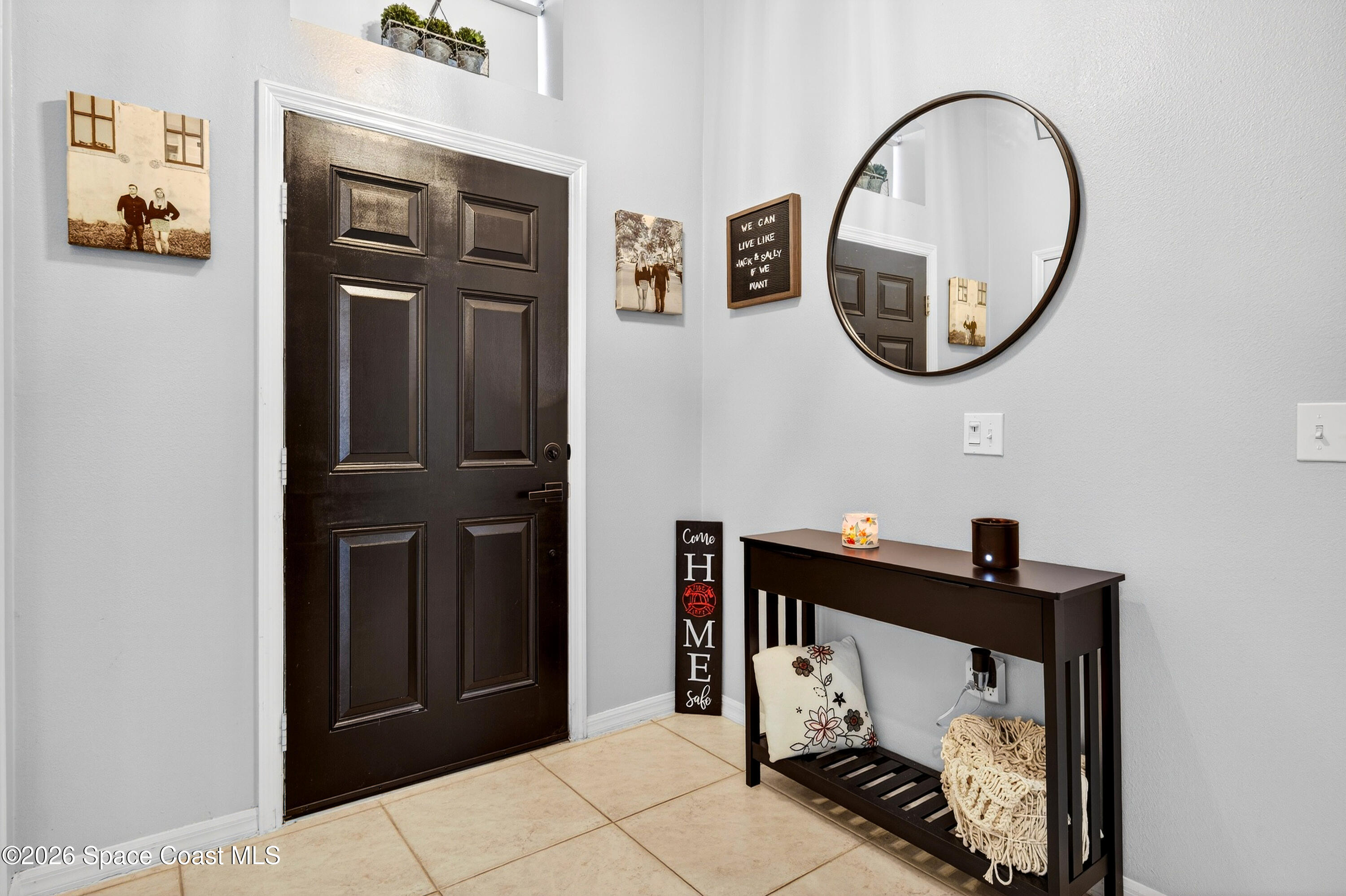3393 Echo Ridge Place Cocoa, FL 32926 - Photo 7 of 40 a view of a hallway with elevator