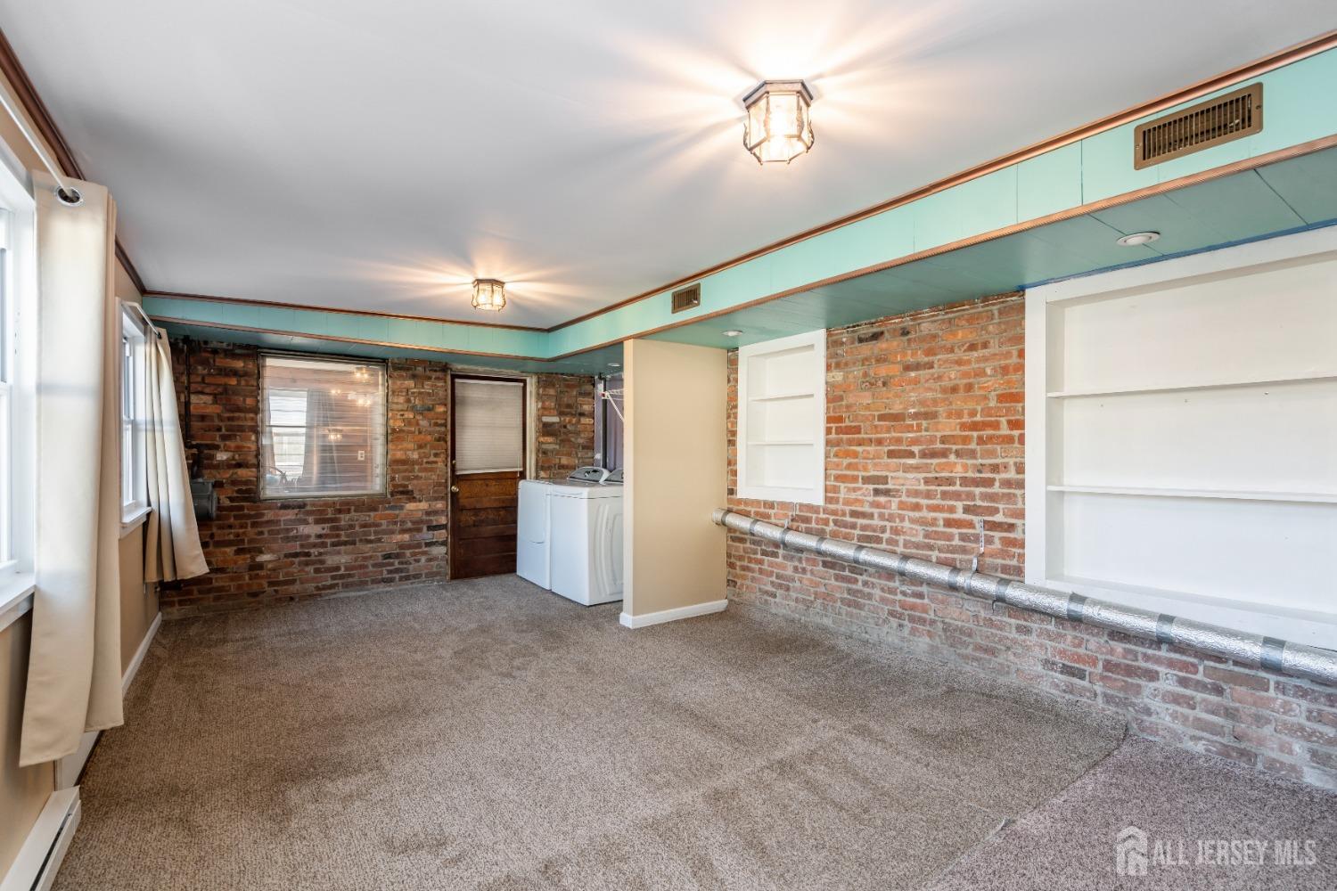 11 Gurley Road Edison, NJ 08817 - Photo 18 of 24 a view of an empty room with a window