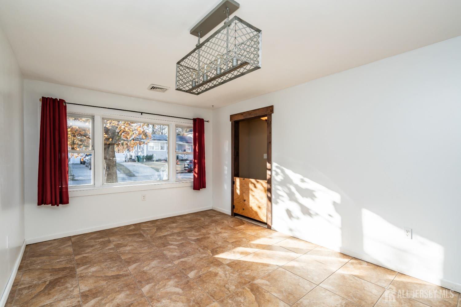11 Gurley Road Edison, NJ 08817 - Photo 19 of 24 a view of a big room with large windows