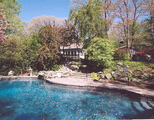 7 Highwood Road Westport, CT 06880 - Photo 1 of 1 a view of a yard with tree s