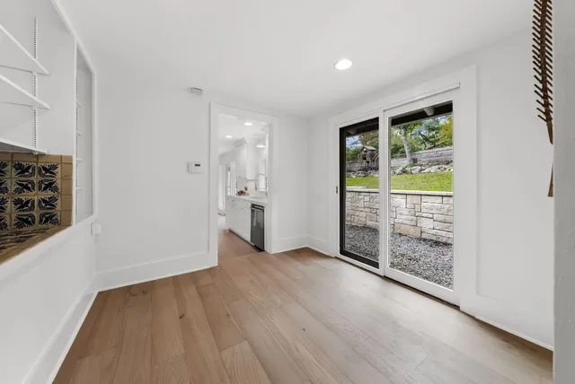 a backyard of a house with lots of green space