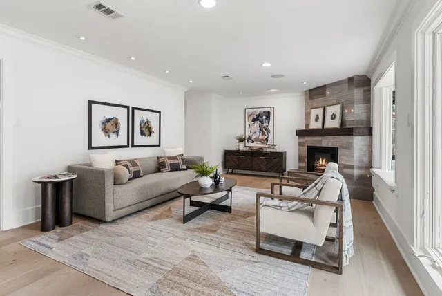 a kitchen with a stove a sink and a refrigerator