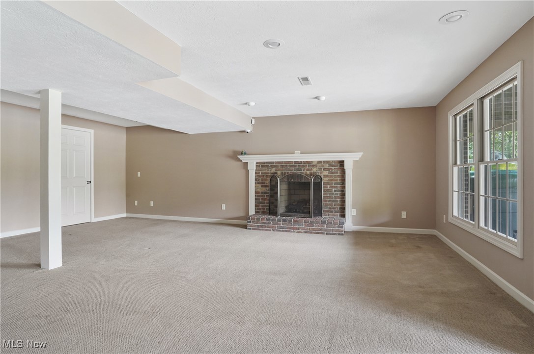5952 Beach Road Wadsworth, OH 44281 - Photo 29 of 40 Family room featuring fireplace