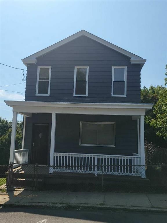 411 Fair Oaks Street McKees Rocks, PA 15136 - Photo 1 of 23 a view of a house with a deck