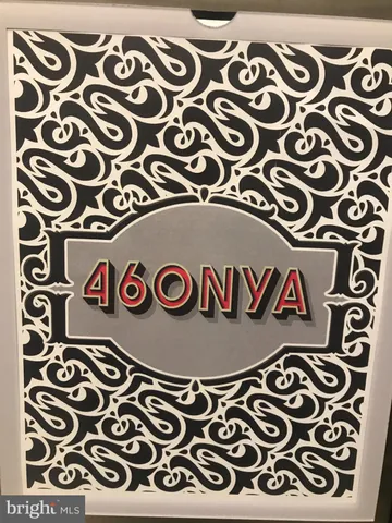 a view of a living room with a flat screen tv