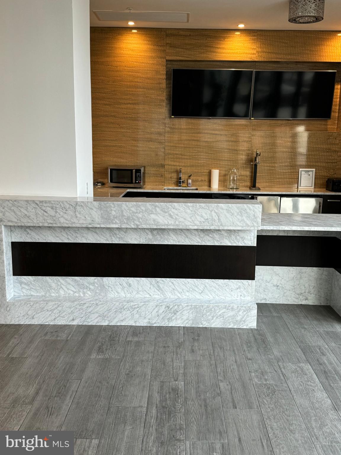 460 New York Avenue Northwest, Unit 407 Washington, DC 20001 - Photo 22 of 64 a view of a living room with a flat screen tv