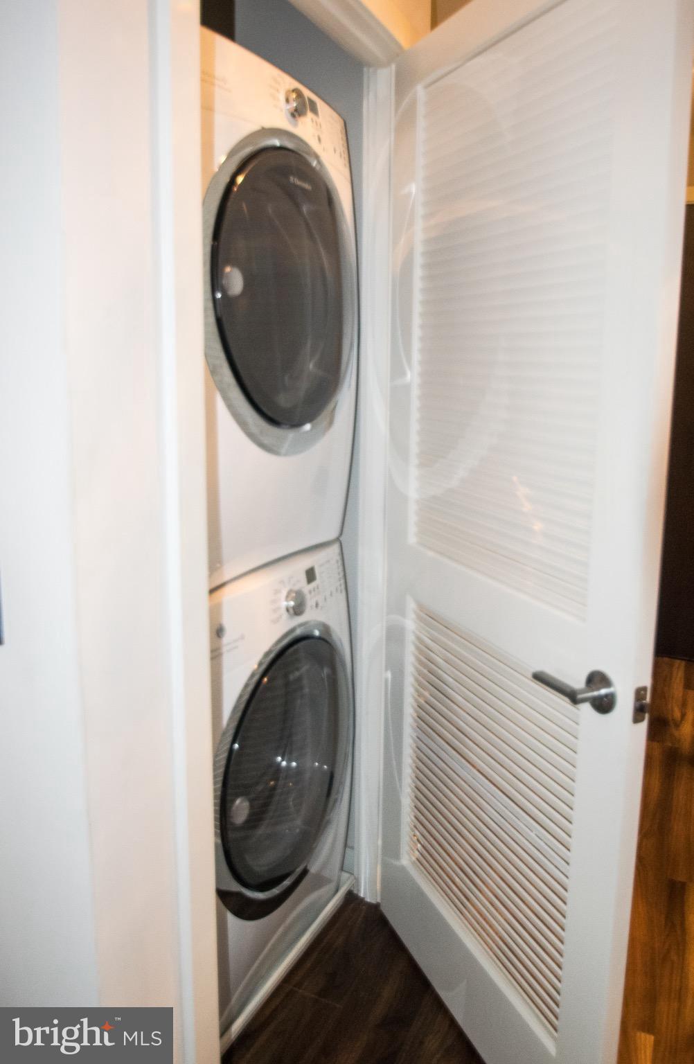 460 New York Avenue Northwest, Unit 407 Washington, DC 20001 - Photo 43 of 64 a close view of a utility room with dryer and washer