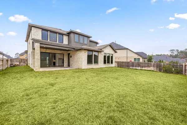 $639,000 | 734 Platinum Stone Lane, Pinehurst, TX 77362