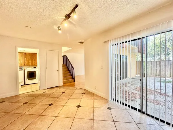 a view of entryway with stairs