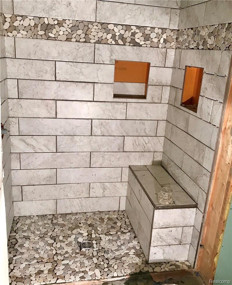 1400 West State Road Lansing, MI 48906 - Photo 4 of 12 Soon to be finished master suite shower.