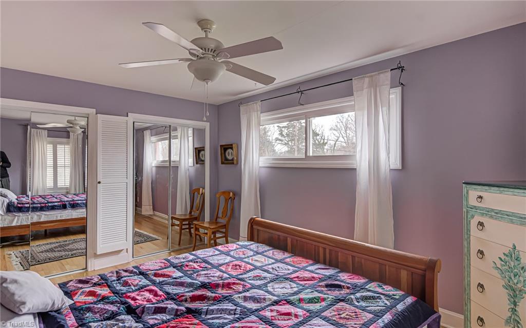 1314 Florida Street High Point, NC 27262 - Photo 22 of 36 Primary Bedroom with double closets and ceiling fan.