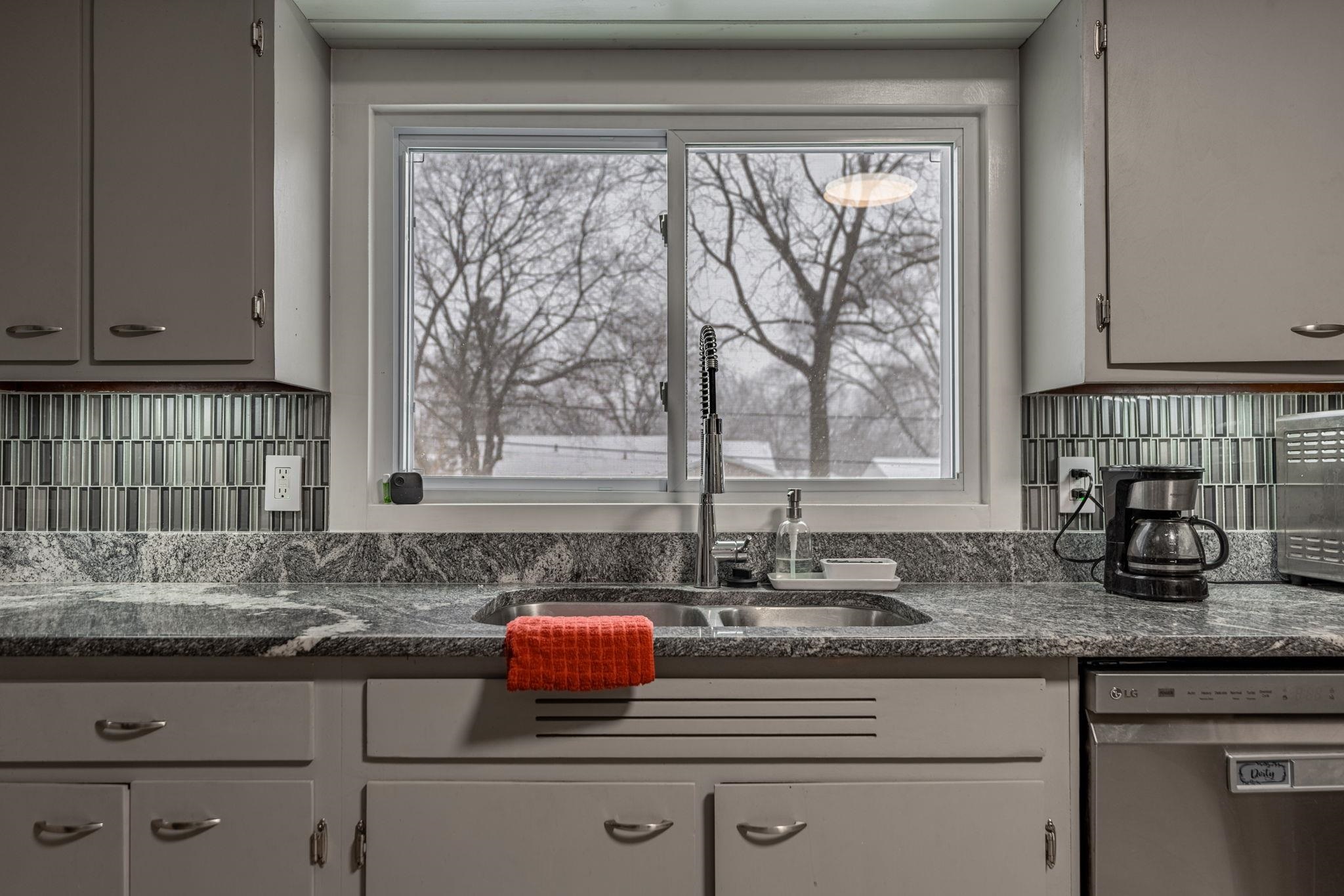 1924 North Alpine Road Rockford, IL 61107 - Photo 13 of 20 a kitchen with granite countertop a sink and a window